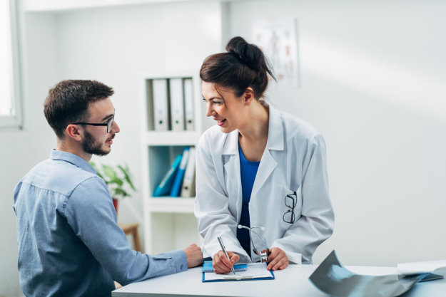 Doctor and patient man consults with doctor at alcohol detox in california